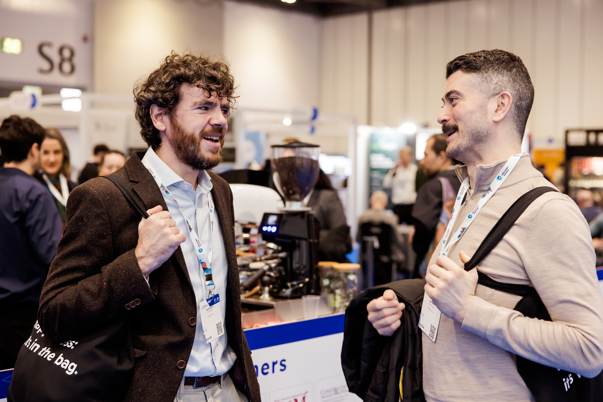 Delegates networking on the exhibition floor